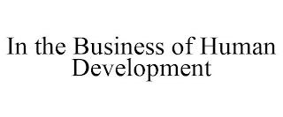 IN THE BUSINESS OF HUMAN DEVELOPMENT trademark